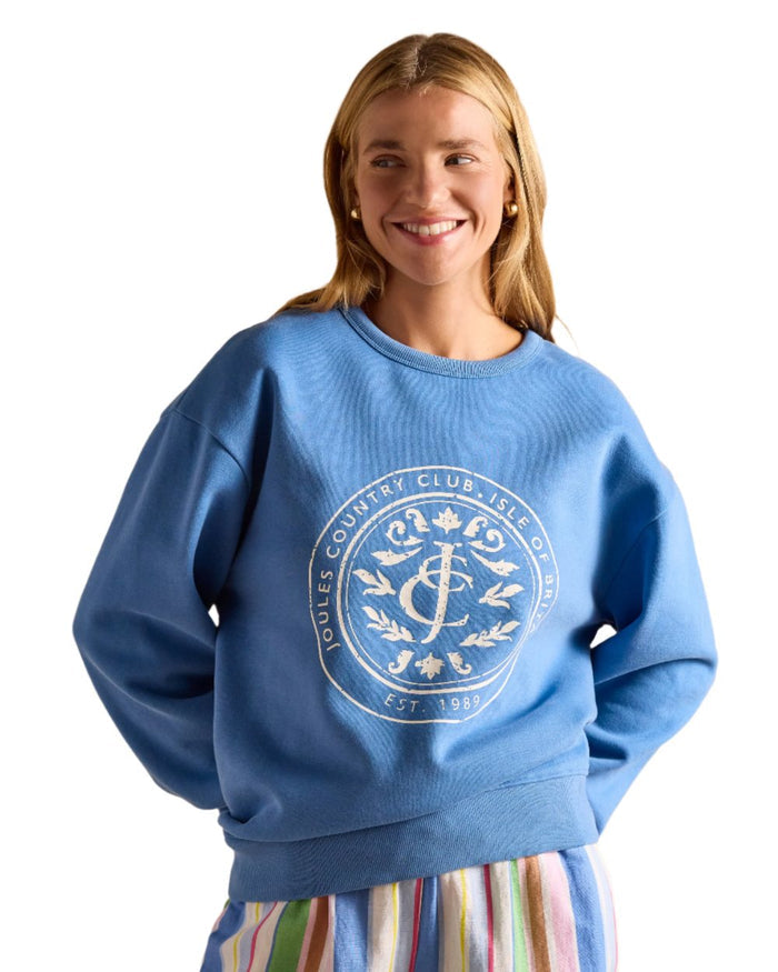 Blue coloured Joules Womens Graphic Crew Neck Sweatshirt on white background #colour_blue