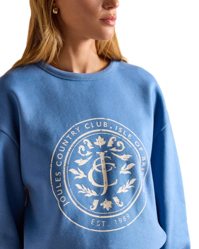 Blue coloured Joules Womens Graphic Crew Neck Sweatshirt on white background #colour_blue