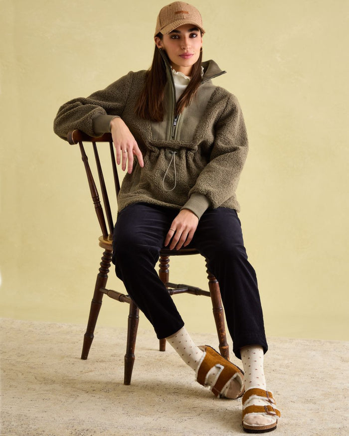 Khaki Green coloured Joules Womens Thurleston Borg Fleece Jacket on wall Background #colour_khaki-green
