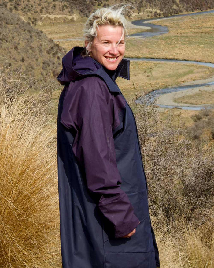 Navy coloured Kaiwaka Agtex Lady of the Land Parka on mountain background #colour_navy