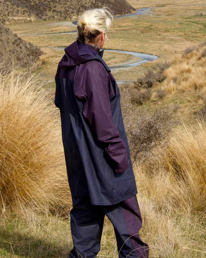 Navy coloured Kaiwaka Agtex Lady of the Land Parka on mountain background #colour_navy
