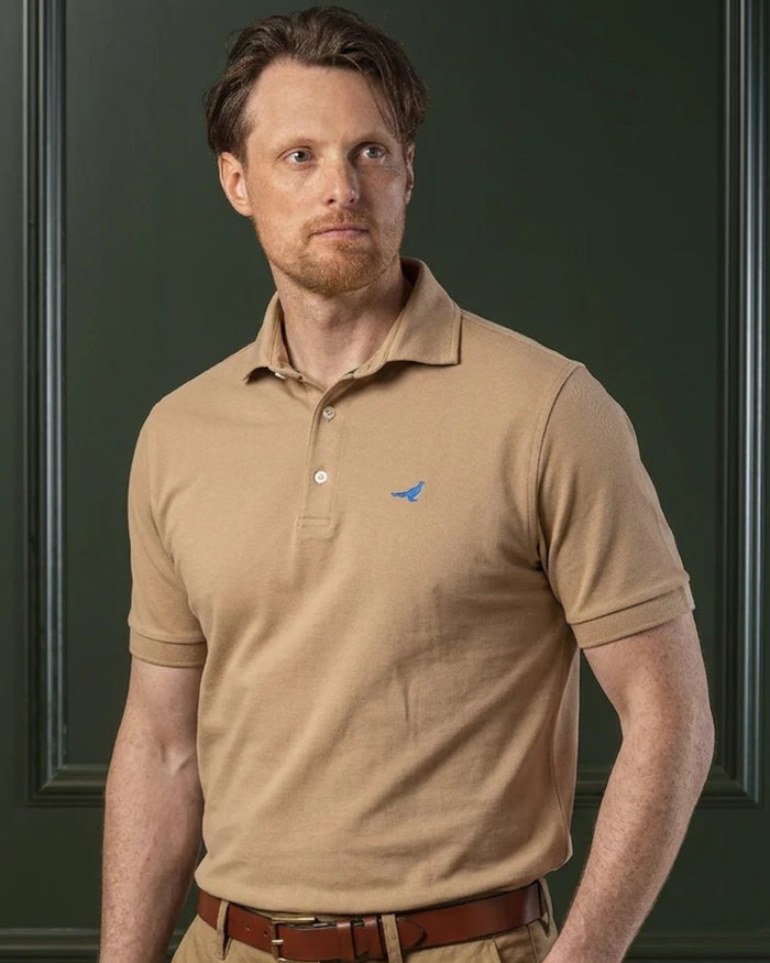 Camel coloured Laksen Mens Amalfi Polo T-Shirt on wall background #colour_camel
