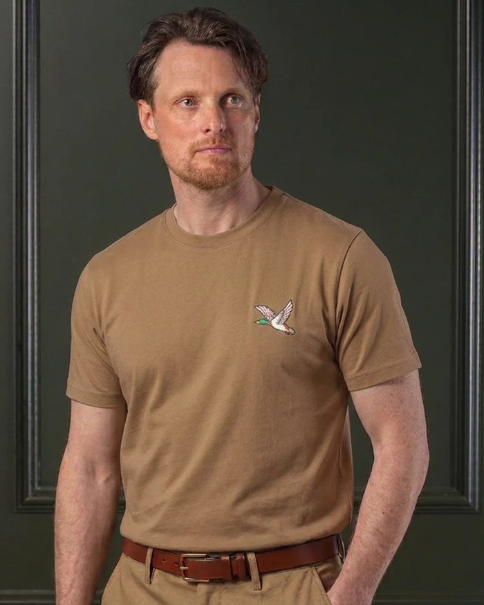 Camel coloured Laksen Mens Duck Cotton T-Shirt on wall background #colour_camel