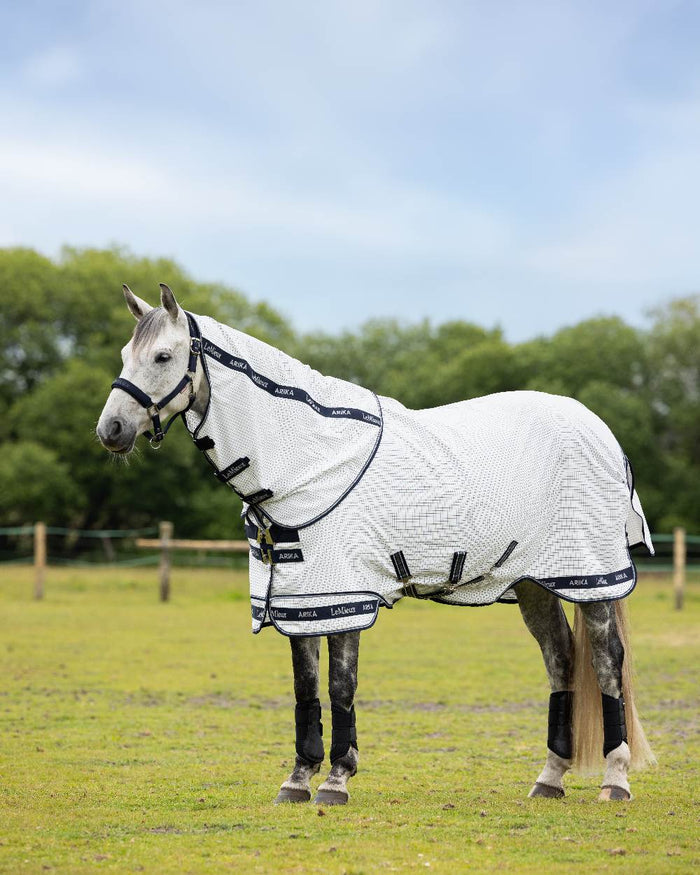 White coloured LeMieux Arika Field Rug on farm background #colour_white
