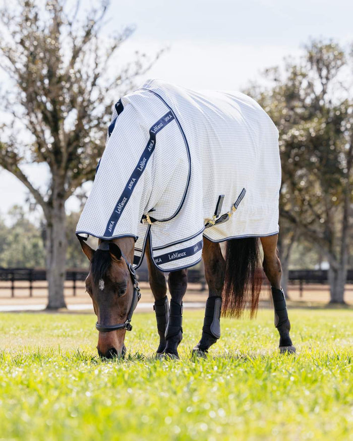 White coloured LeMieux Arika Field Rug on farm background #colour_white