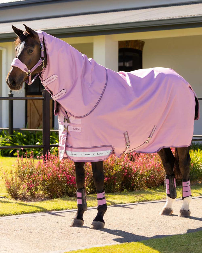 Fondant coloured LeMieux Arika Ripstop 50g Turnout Horse Rug on outdoor background #colour_fondant