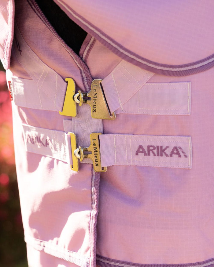 Fondant coloured LeMieux Arika Ripstop 50g Turnout Horse Rug on outdoor background #colour_fondant
