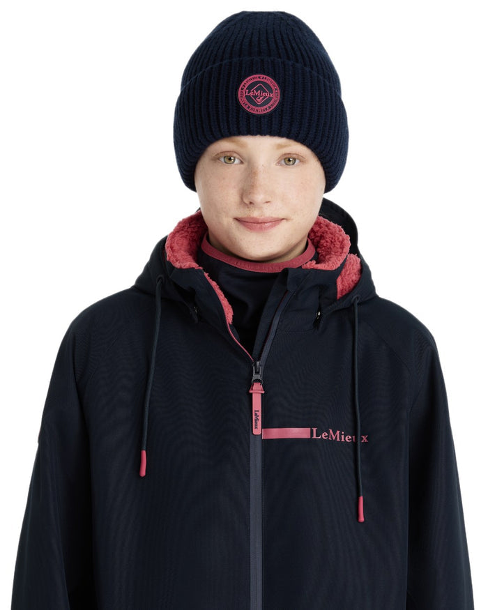 Navy coloured LeMieux Bodie Beanie on white background #colour_navy