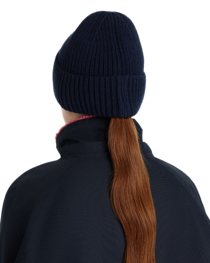Navy coloured LeMieux Bodie Beanie on white background #colour_navy