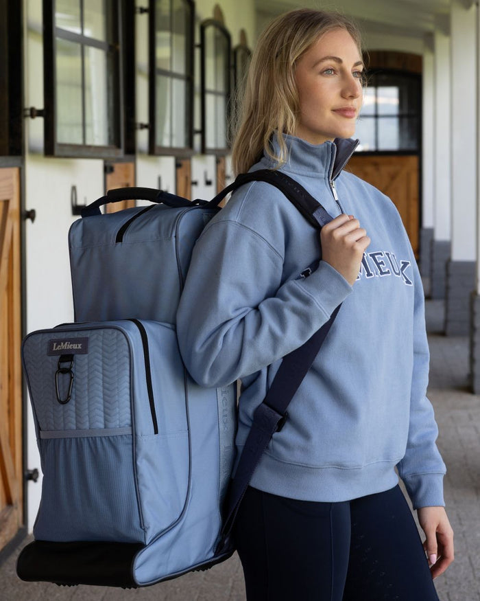 Powder Blue coloured LeMieux Boot & Hat Bag on outdoor background #colour_powder-blue