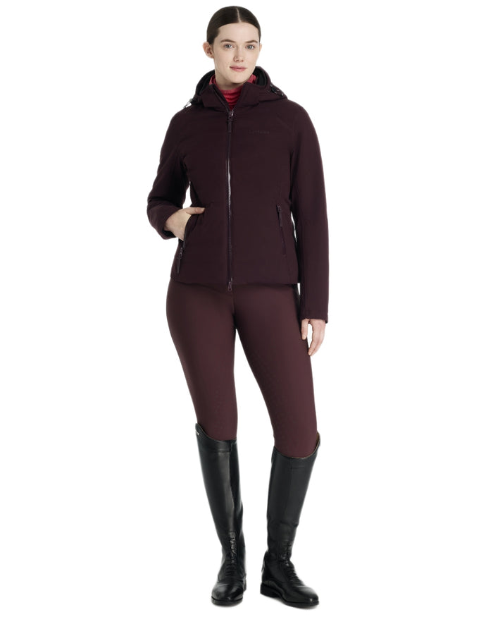 Damson coloured LeMieux Brooke Waterproof Hybrid Jacket on white background #colour_damson