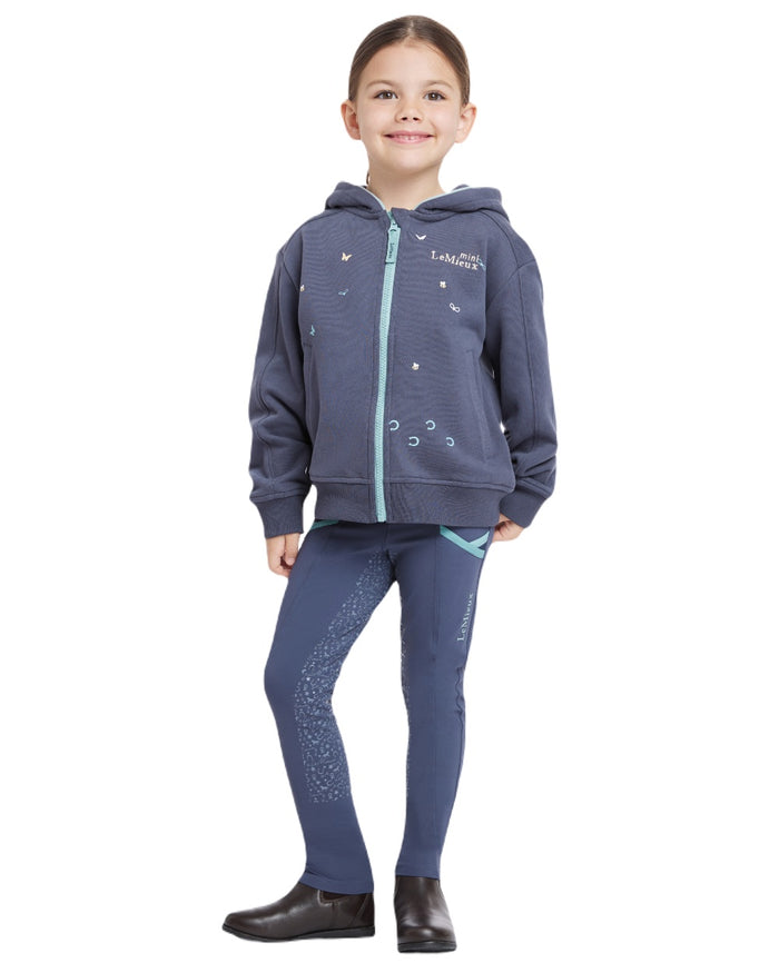 Dusk Blue coloured LeMieux Childrens Mini Charlie Zip Through Hoodie on white background #colour_dusk-blue