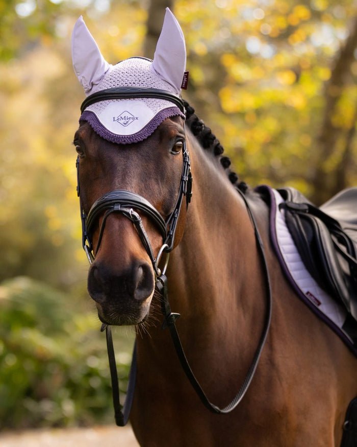 Lilac coloured LeMieux Classic Fly Hood on tree background #colour_lilac