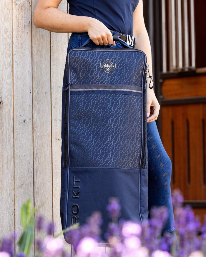 Navy coloured LeMieux Elite Pro Bridle Bag on outdoor background #colour_navy