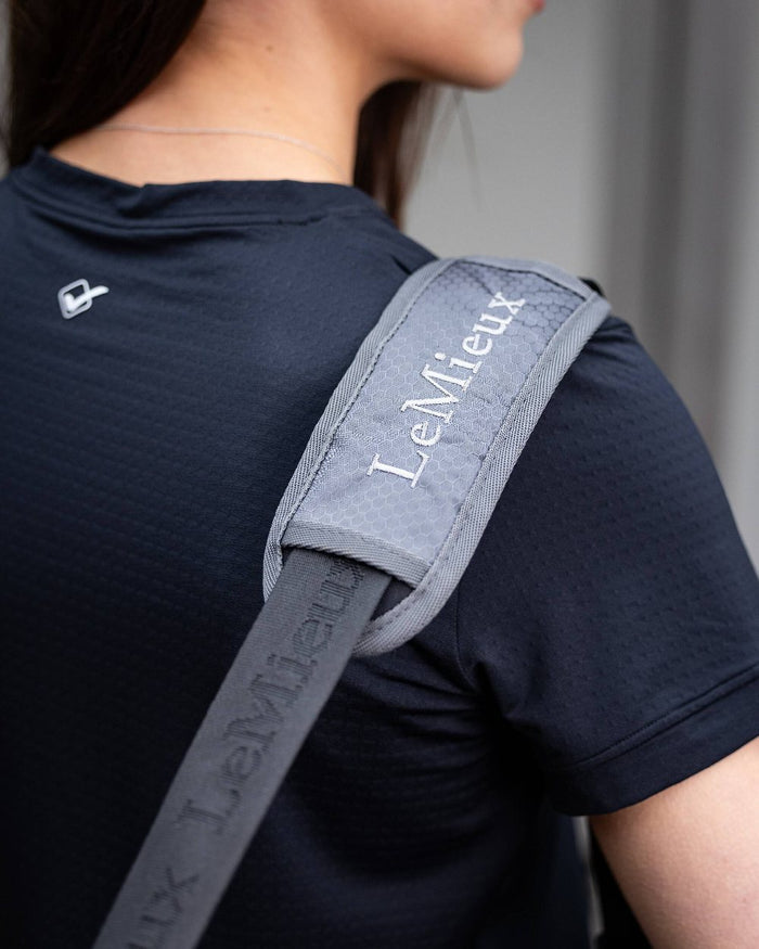 Black coloured LeMieux Grooming Bag on blurry background #colour_black