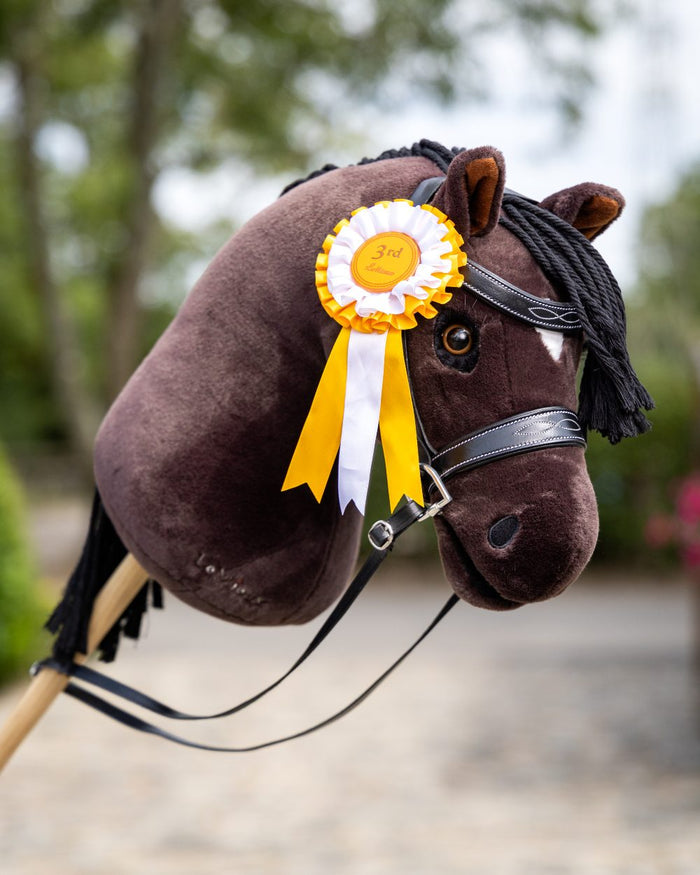 Freya Coloured LeMieux Hobby Horse On A Outer Yard Background #colour_freya