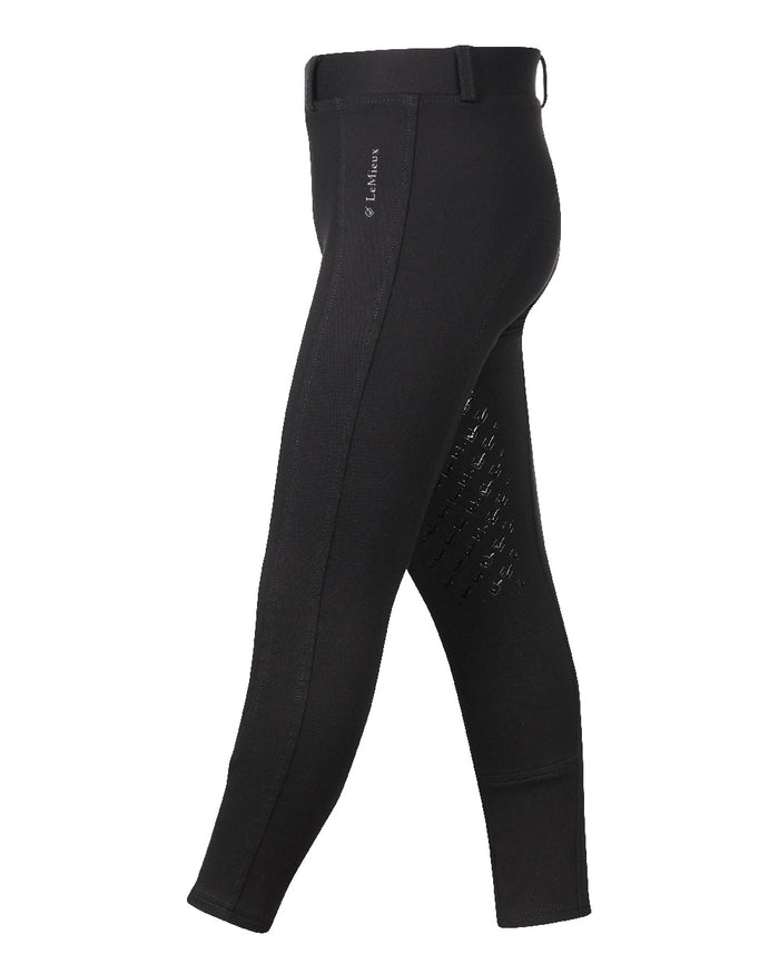 Black coloured LeMieux Junior Pro Breeches on white background #colour_black
