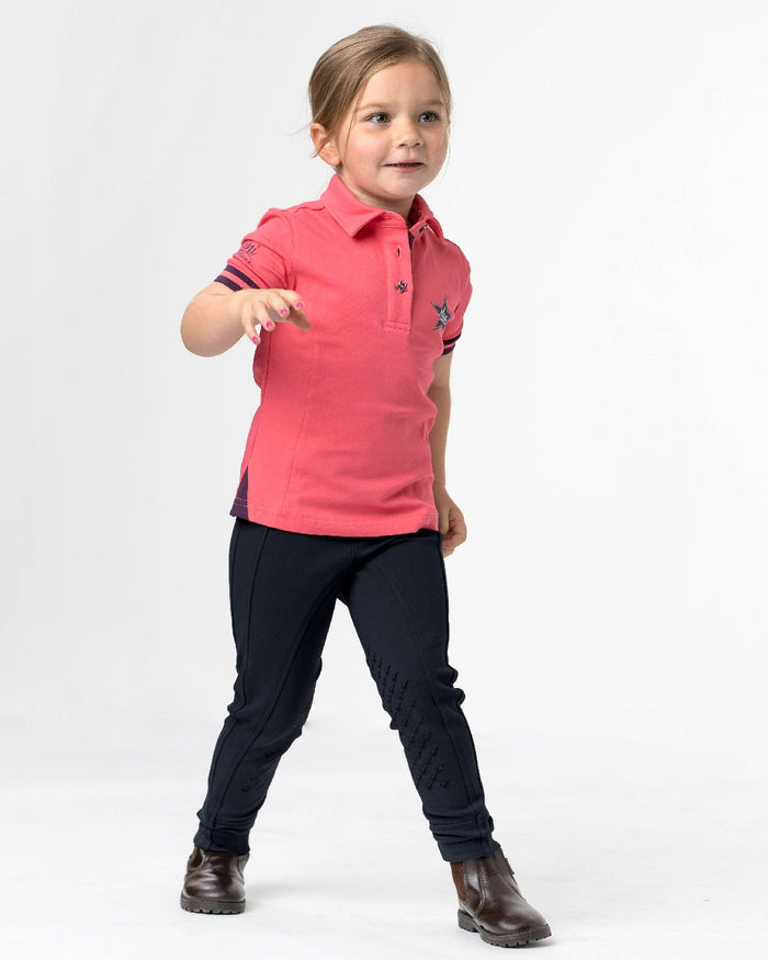 Black coloured LeMieux Junior Pro Breeches on grey background #colour_black