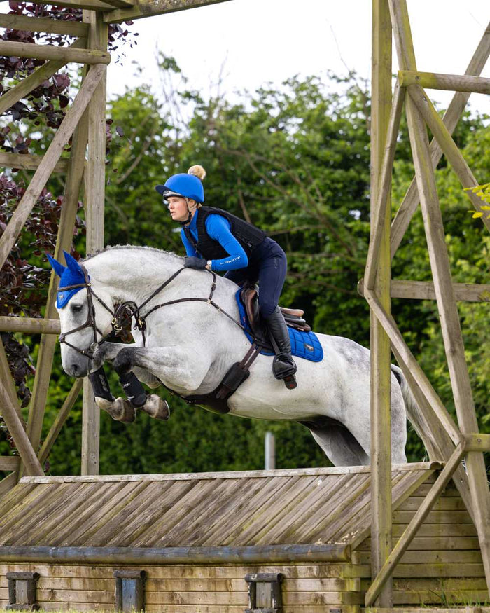 Benetton Coloured LeMieux Loire Close Contact Square On A Riding Arena Background #colour_benetton