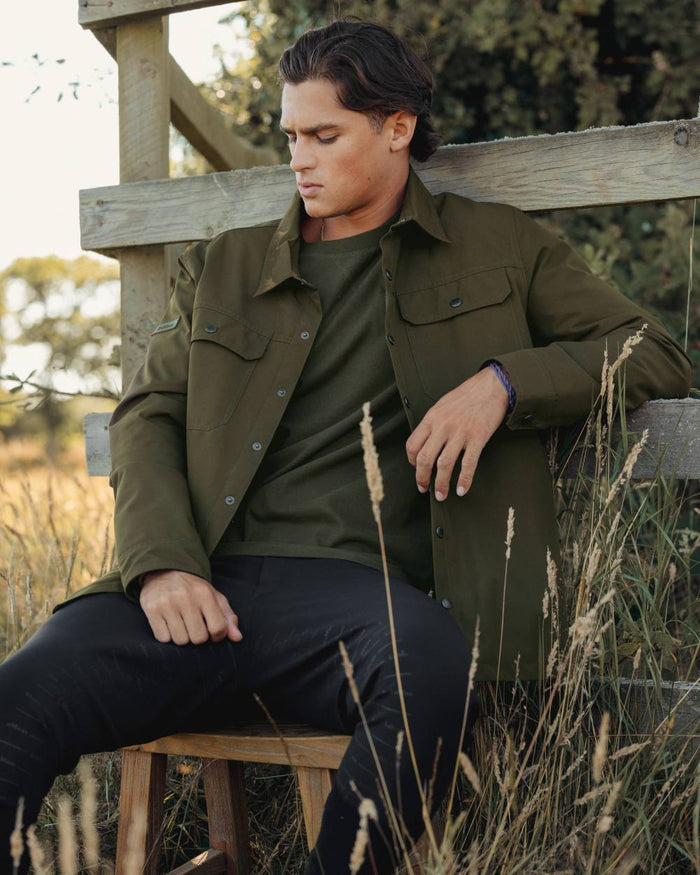 Alpine coloured LeMieux Mens Showerproof Shacket on forest background #colour_alpine