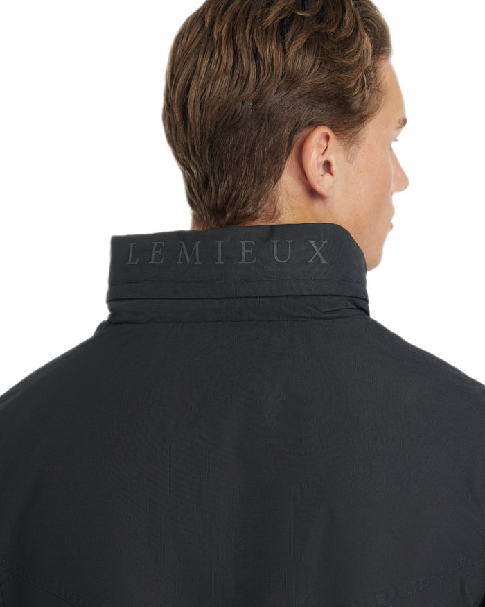 Black coloured LeMieux Mens Waterproof Team Jacket on white background #colour_black