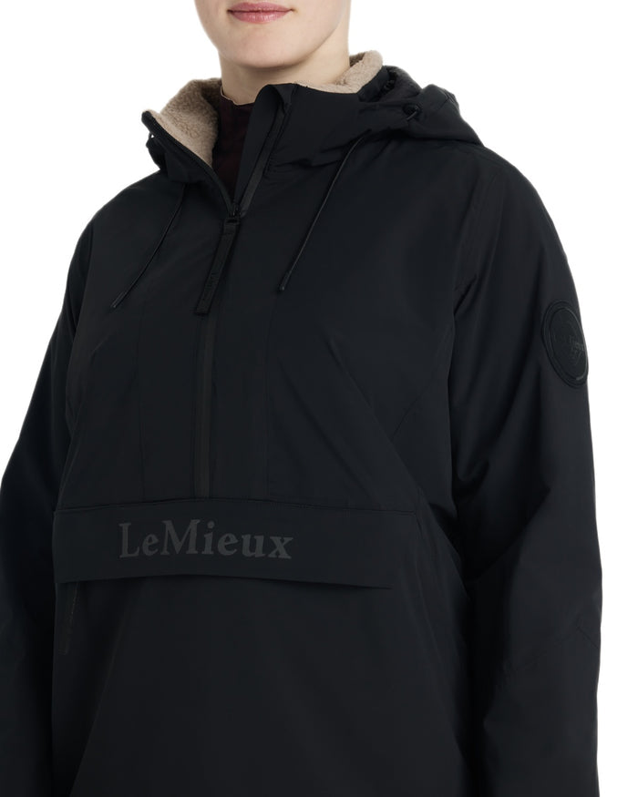Black coloured LeMieux Phoebe Half Zip Waterproof Anorak on white background #colour_black