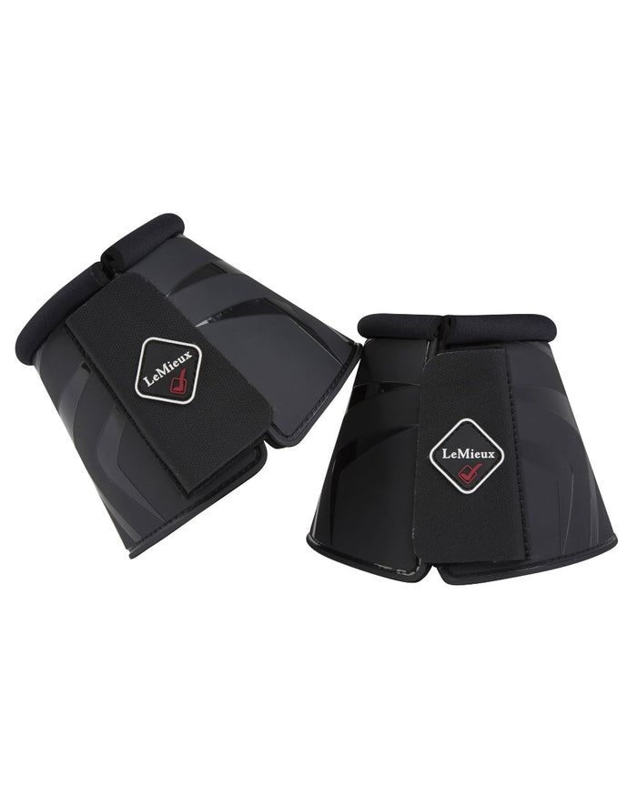 Black coloured LeMieux ProShell Over Reach Boots on white background #colour_black