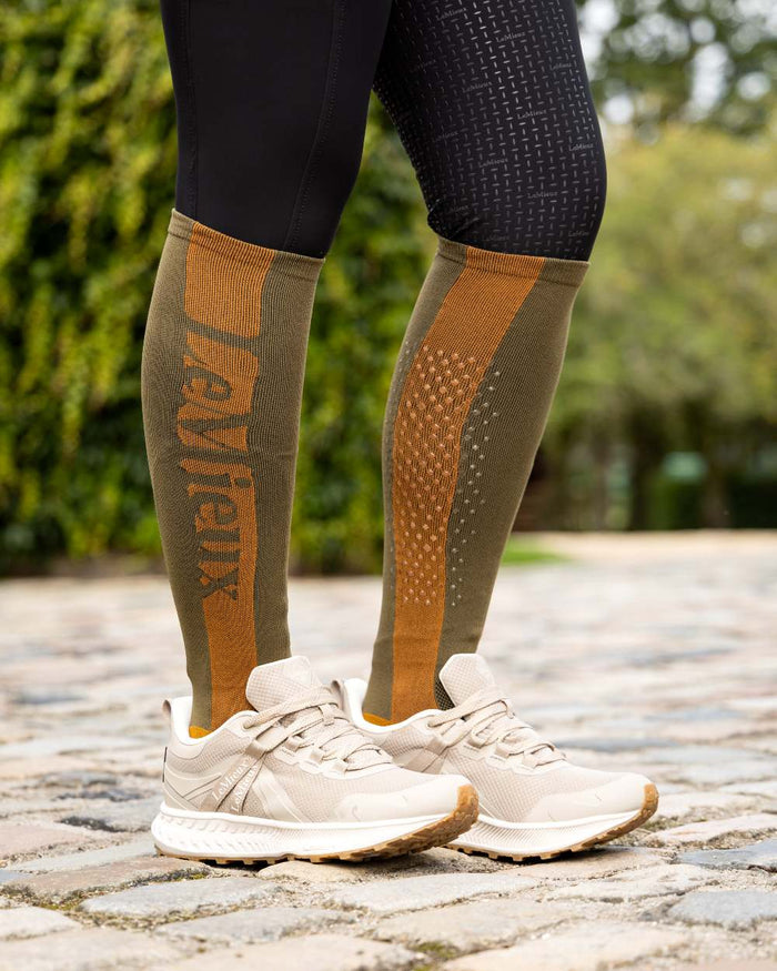Alpine Coloured LeMieux Silicone Socks On A Street Background #colour_alpine