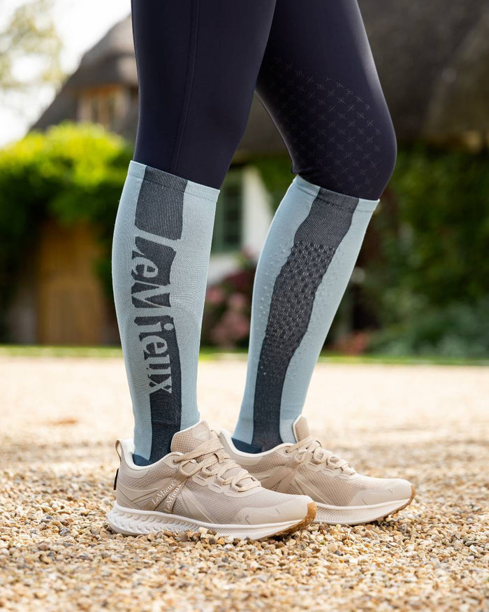 Glacier Coloured LeMieux Silicone Socks On A Street Background #colour_glacier