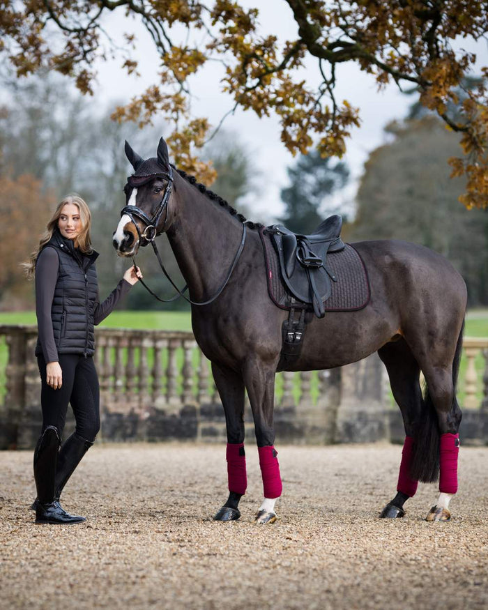 Cinder Coloured LeMieux Suede Dressage Square On A yard Background #colour_cinder
