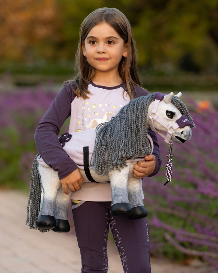 Blanca coloured LeMieux Toy Pony Blanca on garden background #colour_blanca