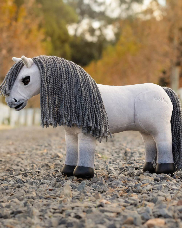 Blanca coloured LeMieux Toy Pony Blanca on tree background #colour_blanca