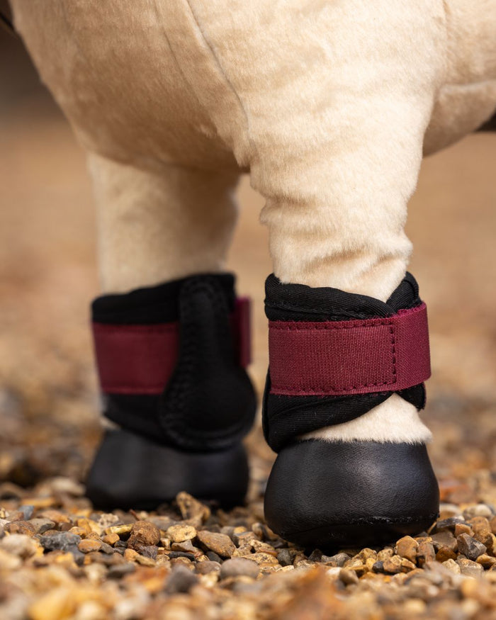 Ember Coloured LeMieux Toy Pony Grafter Boots On A Outer Yard Background #colour_ember