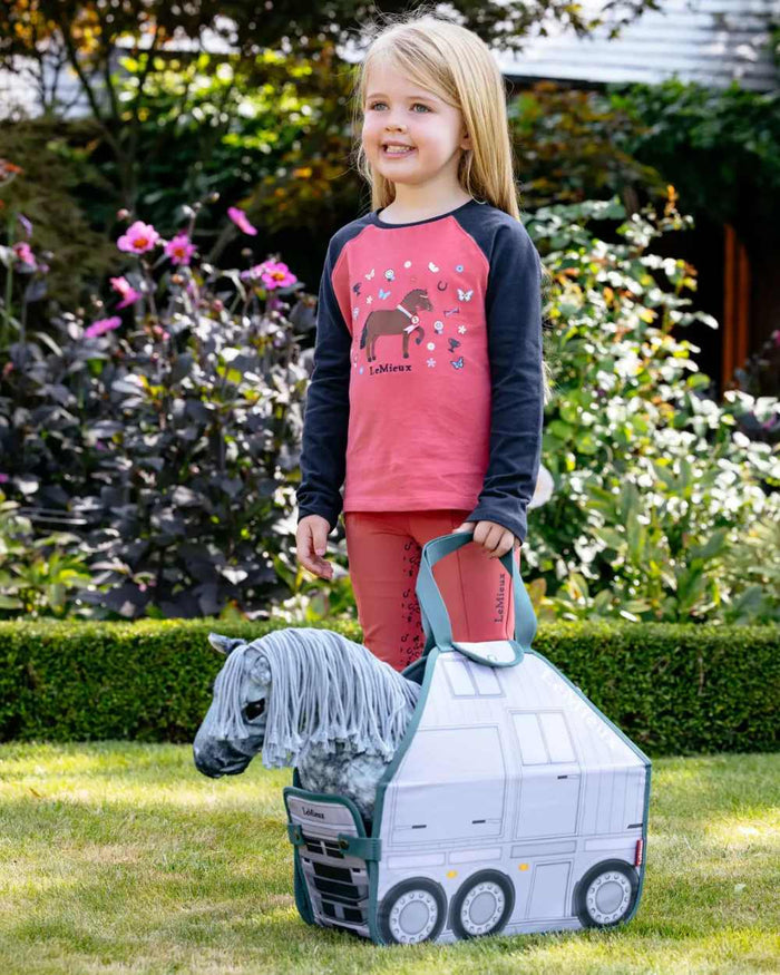 Multi coloured LeMieux Toy Pony Printed Carry Bag on garden background #colour_multi
