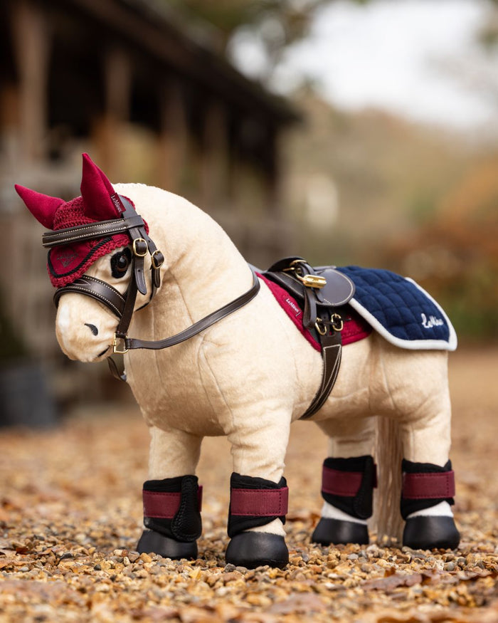 Navy coloured LeMieux Toy Pony Quarter Sheet on outdoor background #colour_navy