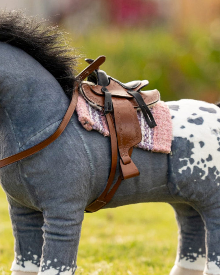 Blossom coloured LeMieux Toy Pony Western Pad on outdoor background #colour_blossom