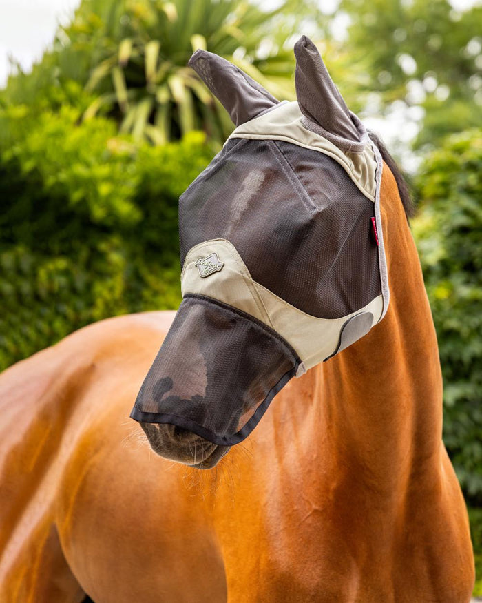 Fern coloured LeMieux Visor Tek Full Fly Mask on outdoor background #colour_fern