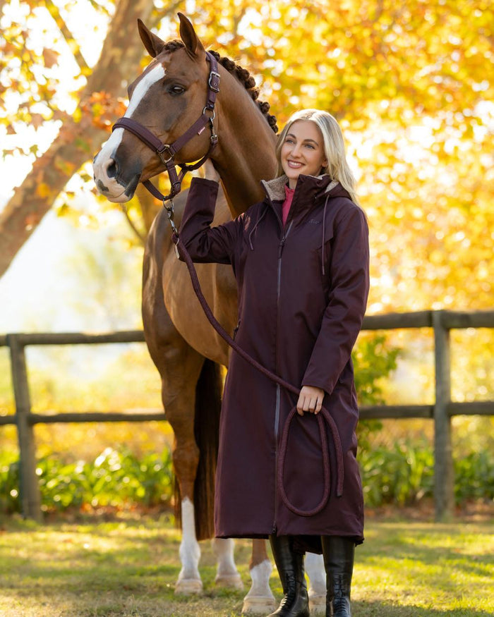 Damson coloured LeMieux Womens All Elements Robe Coat on outdoor background #colour_damson