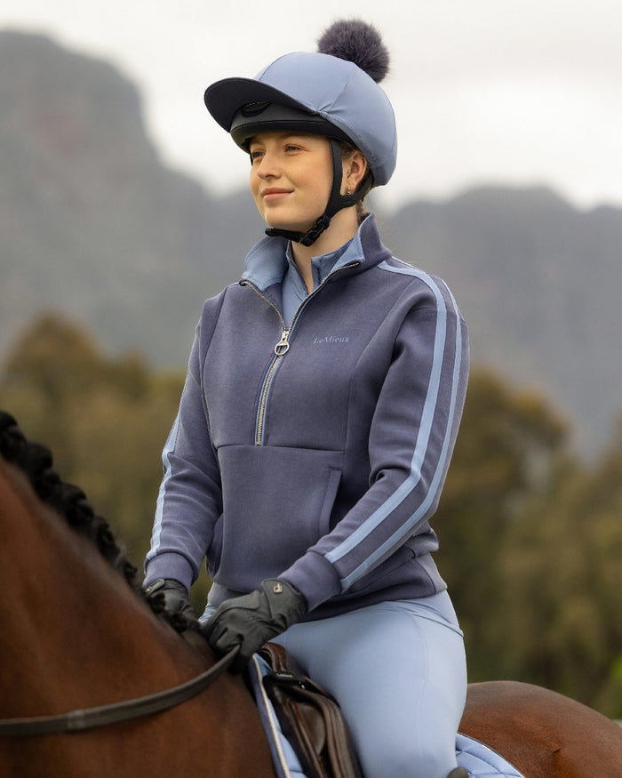Navy coloured LeMieux Womens Connie Half Zip Sweatshirt on outdoor background #colour_navy