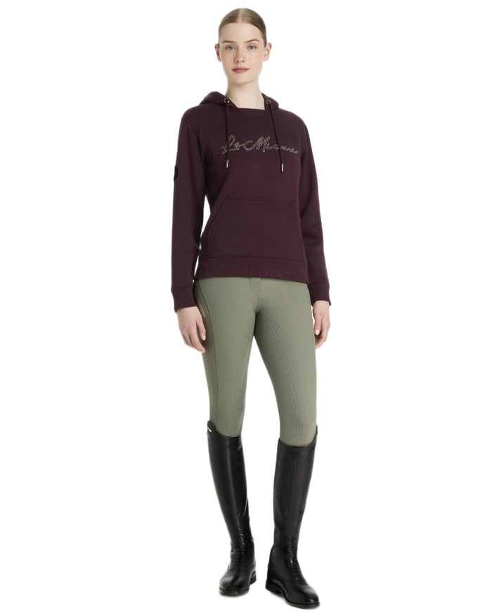 Damson coloured LeMieux Womens Elspeth Hoodie on white background #colour_damson