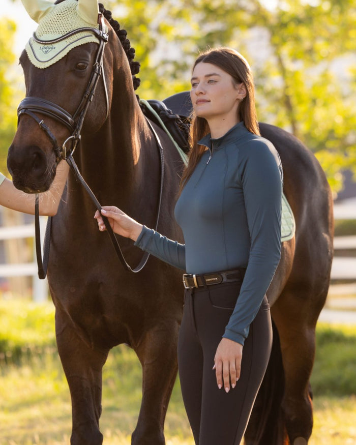 Jungle coloured LeMieux Womens Halle Lightweight Base Layer on outdoor background #colour_jungle