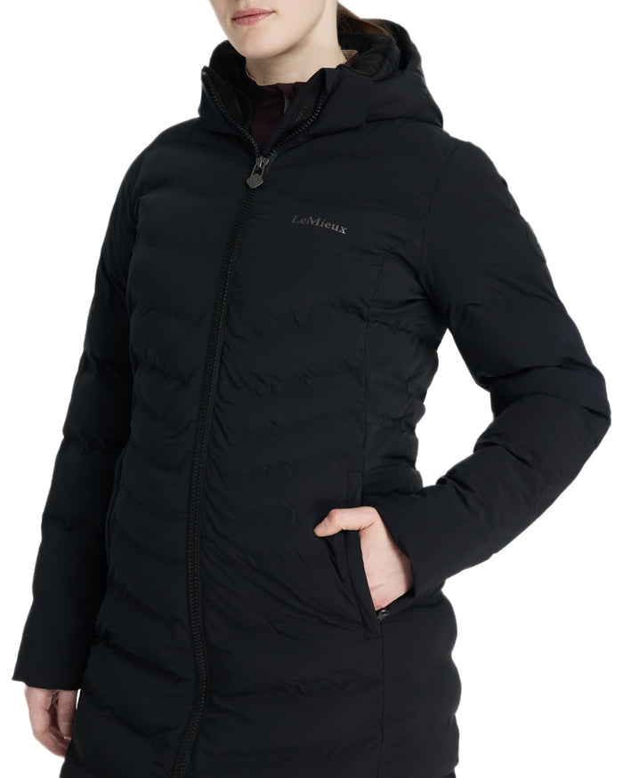 Black coloured LeMieux Womens Hayley Water Resistant Longline Puffer Coat on white background #colour_black