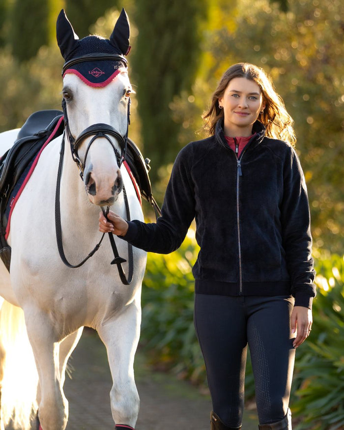 Navy coloured LeMieux Womens Liberty Fleece Zip Through Jacket on tree background #colour_navy