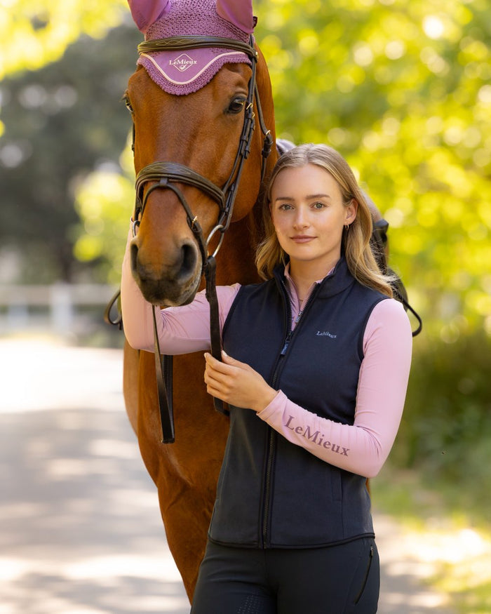 Navy coloured LeMieux Womens Pamela Gilet on outdoor background #colour_navy
