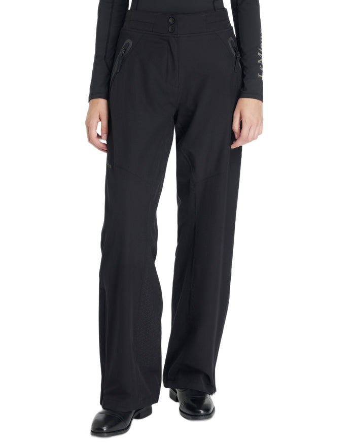 Black coloured LeMieux Womens Stormwear Waterproof Trousers on white background #colour_black
