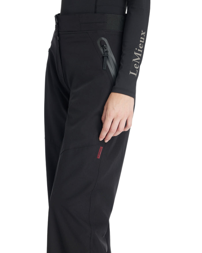 Black coloured LeMieux Womens Stormwear Waterproof Trousers on white background #colour_black