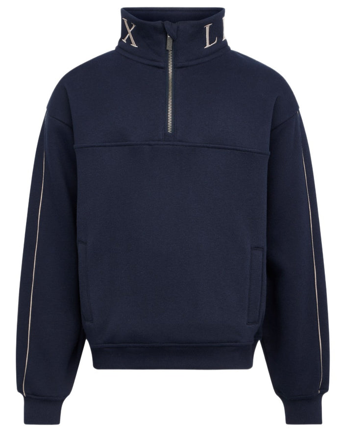 Navy coloured LeMieux Young Rider Kate Quarter Zip Sweater on white background #colour_navy
