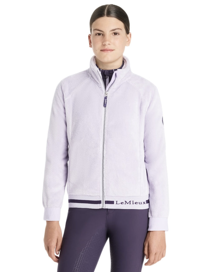 Lilac Coloured LeMieux Young Rider Libby Fleece Jacket On A White Background #colour_lilac
