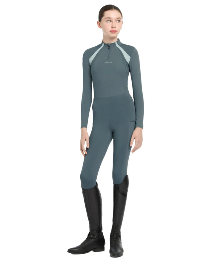Petrol Coloured LeMieux Young Rider Mia Mesh Base Layer On A White Background #colour_petrol