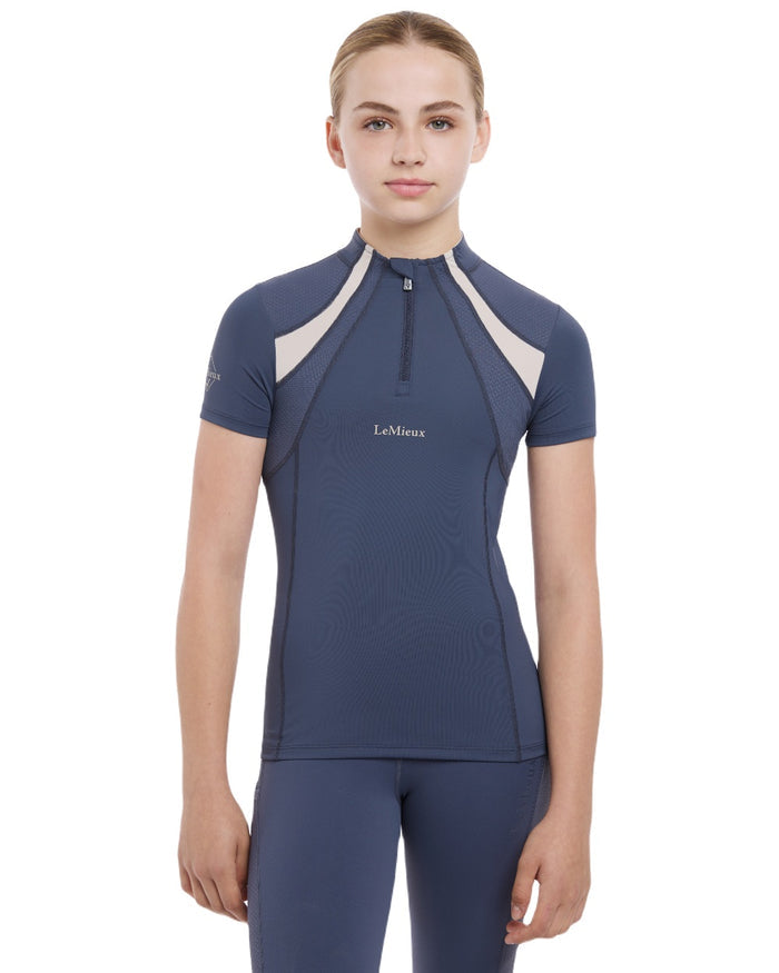 Dusk Blue coloured LeMieux Young Rider Short Sleeve Mia Mesh Base Layer on white background #colour_dusk-blue